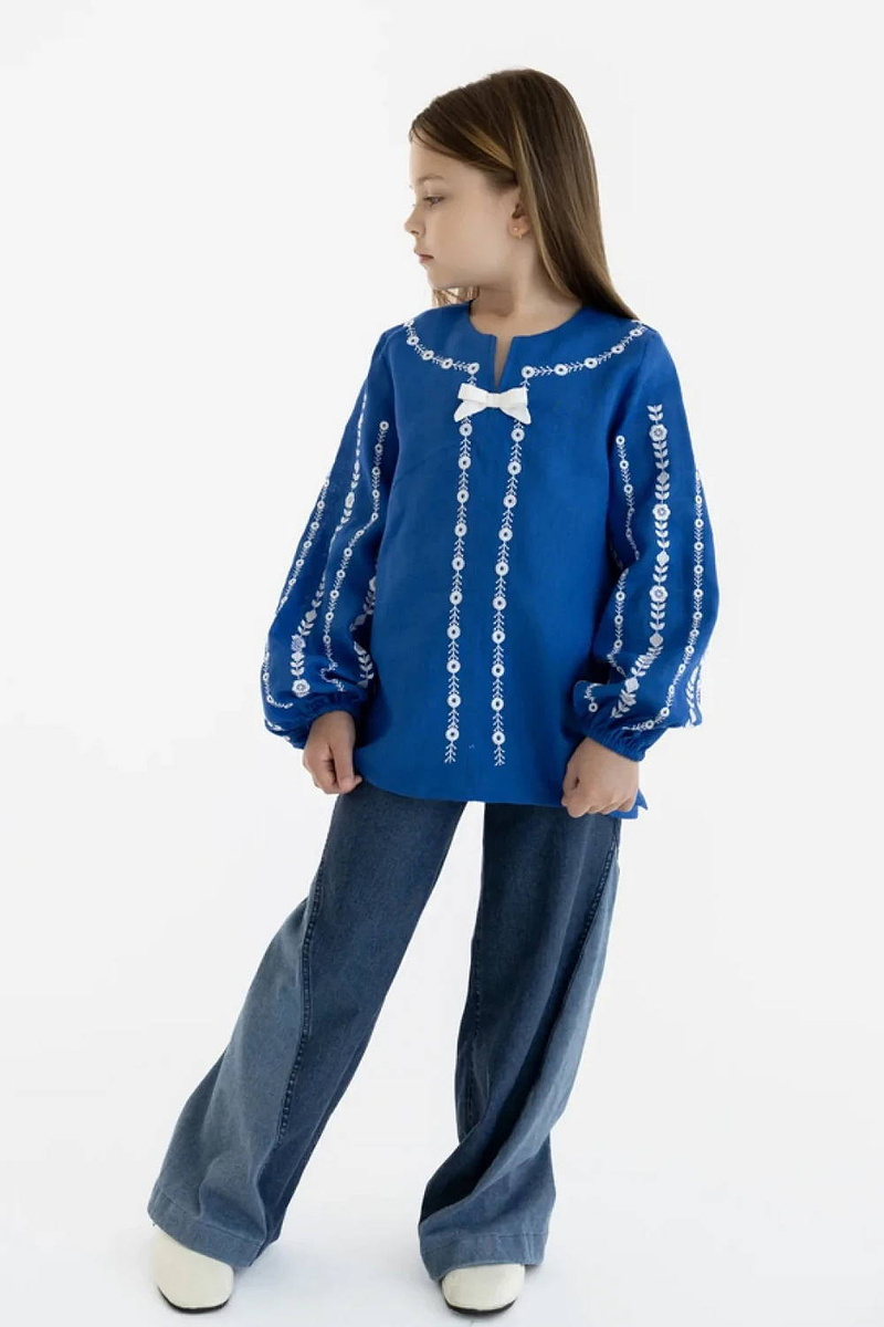 Embroidered blouse for a girl made of blue linen "Yarynka"